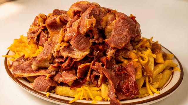 Chili Cheese Fries with Carne Asada or Pastrami.